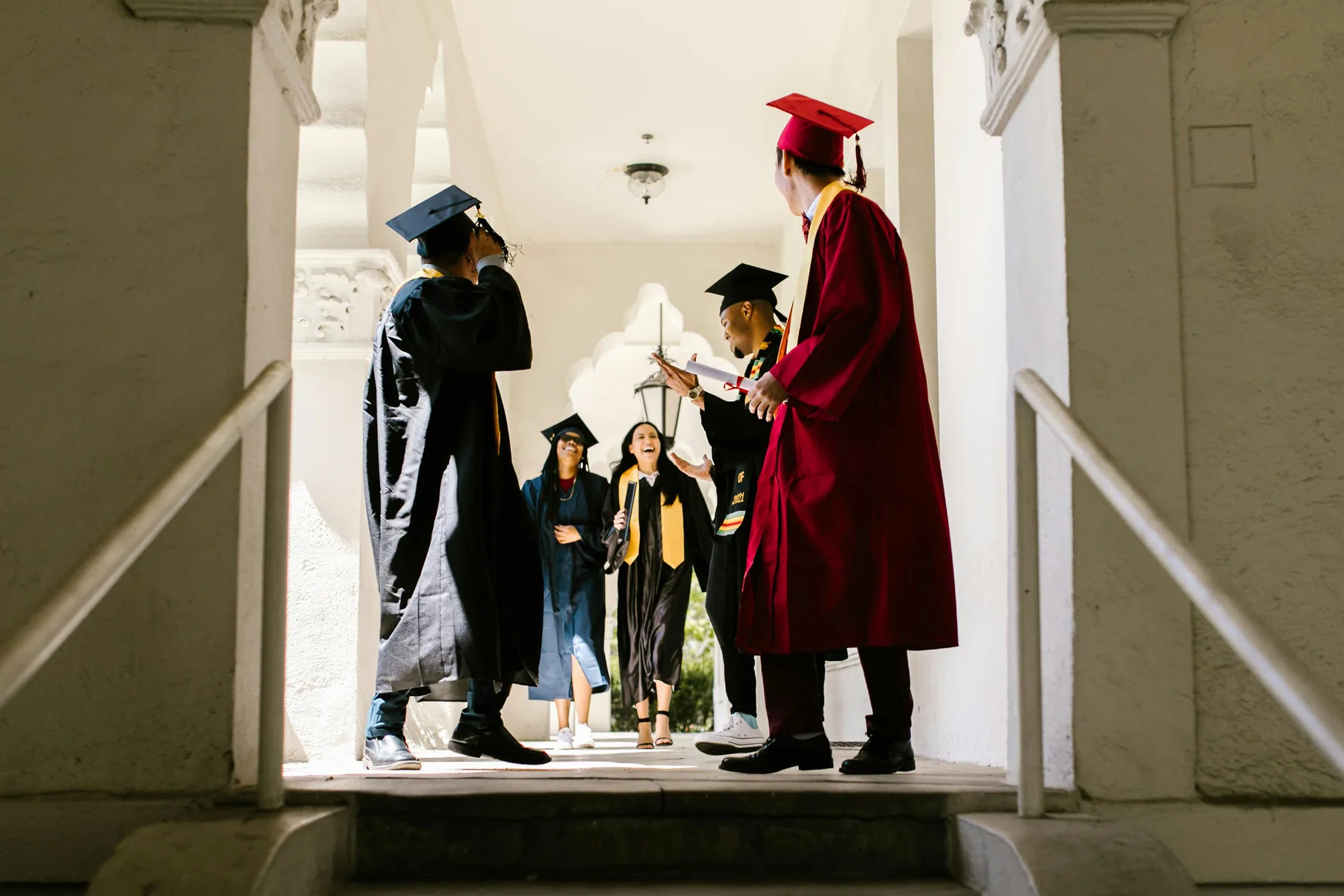 Graduates celebrating together on campus